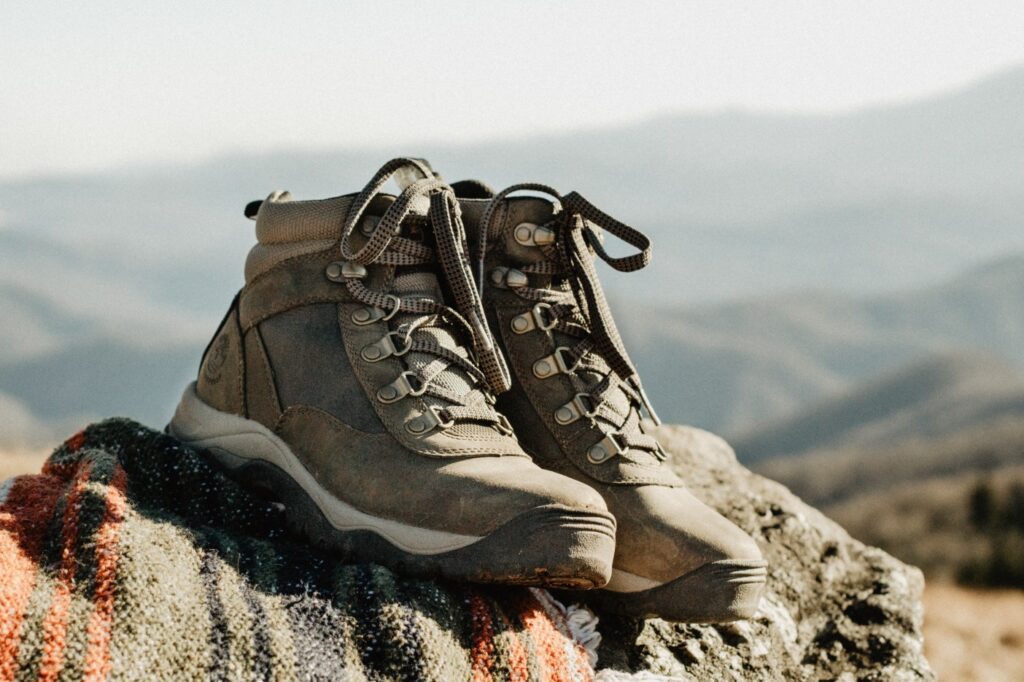 Hiking boots with views of mountains in the background